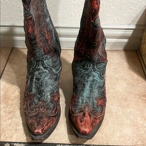 Distressed Leather Cowgirl Boots with Ornate Inlay Design